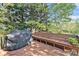 Wooden deck area with grill and bench seating at 60 Bartlett Way, Dallas, GA 30157