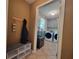 Mudroom entryway and laundry room featuring ample storage and modern washer and dryer set at 60 Bartlett Way, Dallas, GA 30157