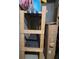 Wooden frame structure with shelving in a basement at 60 Bartlett Way, Dallas, GA 30157