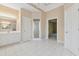 Spacious bathroom featuring double vanity, shower, and white tile floor at 770 Raleigh Sw Ct, Marietta, GA 30064