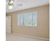 Neutral bedroom with carpeted floors and a window overlooking the outdoors at 770 Raleigh Sw Ct, Marietta, GA 30064