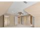 Large bedroom with multiple doors and closets and carpeted floors at 770 Raleigh Sw Ct, Marietta, GA 30064