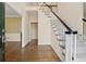 Spacious foyer with hardwood floors, staircase and elegant design at 770 Raleigh Sw Ct, Marietta, GA 30064