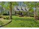 Charming home with lush front yard, mature trees and beautiful landscaping at 770 Raleigh Sw Ct, Marietta, GA 30064