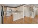 Well-equipped kitchen featuring light wood cabinets and hardwood floors at 770 Raleigh Sw Ct, Marietta, GA 30064