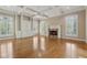 Spacious living room featuring built-in shelving, a fireplace, and coffered ceilings at 770 Raleigh Sw Ct, Marietta, GA 30064