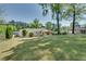 Sprawling green backyard with mature trees and well-manicured lawn at 1802 N Akin Ne Dr, Atlanta, GA 30345