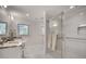 Elegant bathroom featuring a glass-enclosed shower, marble floors, and granite countertops at 1802 N Akin Ne Dr, Atlanta, GA 30345