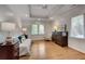 Bright bedroom with hardwood floors, recessed lighting, and large windows at 1802 N Akin Ne Dr, Atlanta, GA 30345