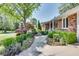 Inviting walkway leading to the front entrance, surrounded by lush landscaping at 1802 N Akin Ne Dr, Atlanta, GA 30345
