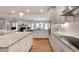 Well-appointed kitchen features white cabinets, granite countertops, and stainless appliances at 1802 N Akin Ne Dr, Atlanta, GA 30345