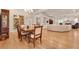 Spacious living room with hardwood floors and a cozy dining area at 1802 N Akin Ne Dr, Atlanta, GA 30345
