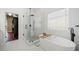 Elegant bathroom featuring a freestanding tub, glass shower, and modern design at 2564 Walden Estates Dr, Marietta, GA 30062