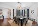 Dining area with tray ceiling, elegant curtains and view of the front door and entrance at 2564 Walden Estates Dr, Marietta, GA 30062