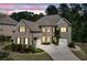 Charming brick home featuring manicured landscaping, attached two-car garage, and a well-maintained lawn at 2564 Walden Estates Dr, Marietta, GA 30062