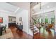 Welcoming foyer leading to a living room and kitchen, highlighting beautiful hardwood floors at 2564 Walden Estates Dr, Marietta, GA 30062