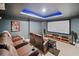Home theater with reclining leather seating, projector screen, and recessed lighting, creating an immersive viewing experience at 2564 Walden Estates Dr, Marietta, GA 30062