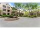 Charming courtyard showcasing lush greenery, mature trees, and pathways for relaxing strolls at 3475 Oak Valley Road Ne # 870, Atlanta, GA 30326