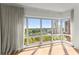 Spacious living room featuring natural light and city views through large windows at 3475 Oak Valley Road Ne # 870, Atlanta, GA 30326