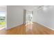 This bright living room boasts hardwood floors, neutral walls, and large windows at 3475 Oak Valley Road Ne # 870, Atlanta, GA 30326