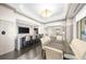 Entertaining recreation room with a long dining table, television, bar, and modern finishes at 3475 Oak Valley Road Ne # 870, Atlanta, GA 30326