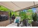 Spacious deck with awning, grill, ample seating, and lots of privacy at 3663 Brookhaven Manor Ne Xing, Atlanta, GA 30319