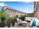 Spacious deck with outdoor seating and potted plants overlooking a private backyard at 3663 Brookhaven Manor Ne Xing, Atlanta, GA 30319