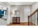 Inviting foyer with hardwood floors, decorative mirror and staircase at 3663 Brookhaven Manor Ne Xing, Atlanta, GA 30319