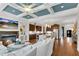 Bright, open-concept living space boasts a kitchen, fireplace, and comfortable seating, perfect for relaxation at 3663 Brookhaven Manor Ne Xing, Atlanta, GA 30319