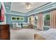 Main bedroom with sitting area, lots of natural light, and luxurious furnishings at 3663 Brookhaven Manor Ne Xing, Atlanta, GA 30319