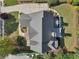 Aerial view of home showing roof, driveway, and lush, landscaped backyard and lawn at 403 Grassmeade Way, Snellville, GA 30078