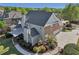 Spacious backyard features a lush lawn, privacy fence, and a cozy outdoor dining area at 403 Grassmeade Way, Snellville, GA 30078