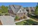 Beautiful two-story brick home boasts a manicured lawn and attached two-car garage at 403 Grassmeade Way, Snellville, GA 30078