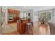 Kitchen and breakfast nook featuring a center island, stainless appliances, and hardwood floors at 403 Grassmeade Way, Snellville, GA 30078