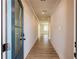 Bright entryway featuring beautiful floors and modern lighting, leading into a spacious interior at 4202 Adler Cir, Buford, GA 30519