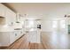 Spacious kitchen with island, white cabinetry, stainless appliances, and ample natural light at 4202 Adler Cir, Buford, GA 30519
