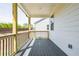 The house has a large porch with black metal railings, and wood posts at 4202 Adler Cir, Buford, GA 30519