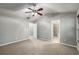 Spacious bedroom features two doorways and large windows with a neutral color palette at 11302 Musette Cir, Alpharetta, GA 30009