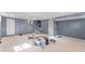 Unfinished basement view with gray walls, white trim, and staircase at 1441 Cahaba Sw Dr, Atlanta, GA 30311