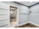 Walk-in closet with wire shelving and access to a luxurious shower at 1441 Cahaba Sw Dr, Atlanta, GA 30311