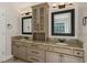 Bathroom featuring double vanity, granite countertops, and updated fixtures at 2500 Kingsbrooke Ln, Duluth, GA 30097