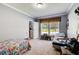 Comfortable bedroom with natural light and closet access, perfect for a restful retreat at 537 Craven Rd, Roopville, GA 30170