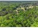 A picturesque neighborhood surrounded by lush trees and serene landscapes; homes well spaced at 135 Fiddle Crk, Social Circle, GA 30025