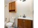 Bathroom with tub and shower features built-in cabinet above the toilet at 135 Fiddle Crk, Social Circle, GA 30025