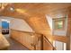 Hallway with wooden ceiling, railing and view of bedroom with blue walls at 135 Fiddle Crk, Social Circle, GA 30025