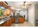Kitchen featuring stainless steel appliances, double sinks, and barstool seating at 135 Fiddle Crk, Social Circle, GA 30025