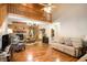 Spacious living room with hardwood floors, loft and a view to the dining area at 135 Fiddle Crk, Social Circle, GA 30025