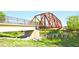 Rustic bridge perfect for hiking, biking, and enjoying nature and green spaces on the community property at 2557 Summit Cove Dr # 128, Duluth, GA 30097
