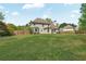 Well-maintained backyard showing ample green space, perfect for recreation and outdoor activities at 2850 Dartmouth Pl, Cumming, GA 30041