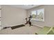 Versatile exercise room with natural light and space for workout equipment at 2850 Dartmouth Pl, Cumming, GA 30041